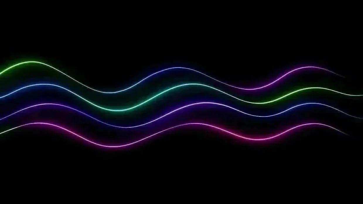 Several colorful neon light waves on a black background.