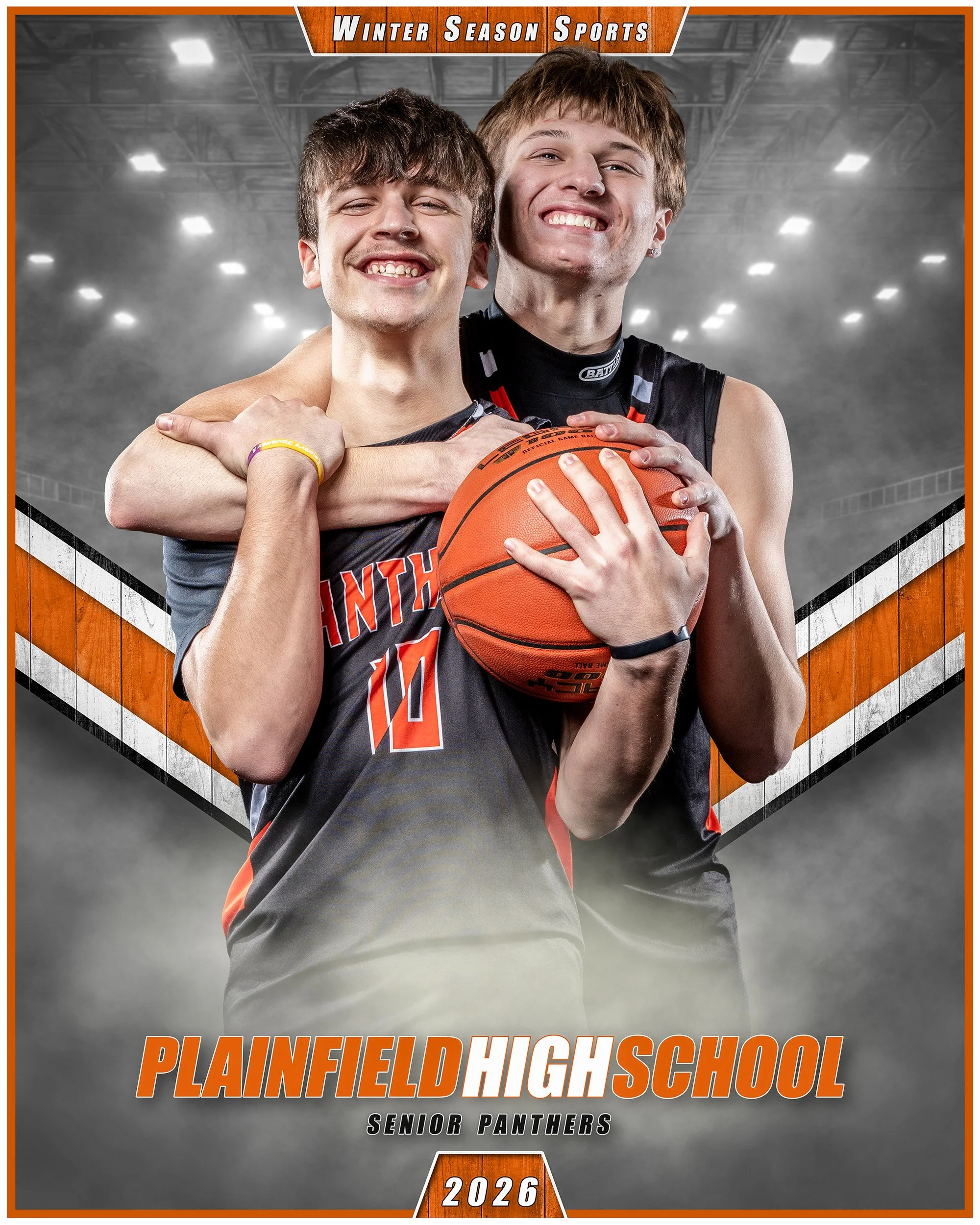 Two young men in basketball uniforms smiling and posing with a basketball inside an indoor basketball arena with bright lights. One has his arm around the other's shoulder, holding the basketball together. The image features text about Winter Season 