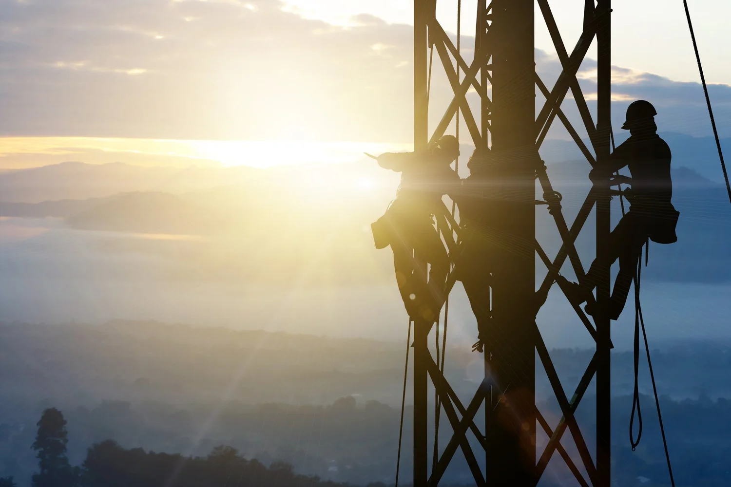 Construction workers completing an industrial project