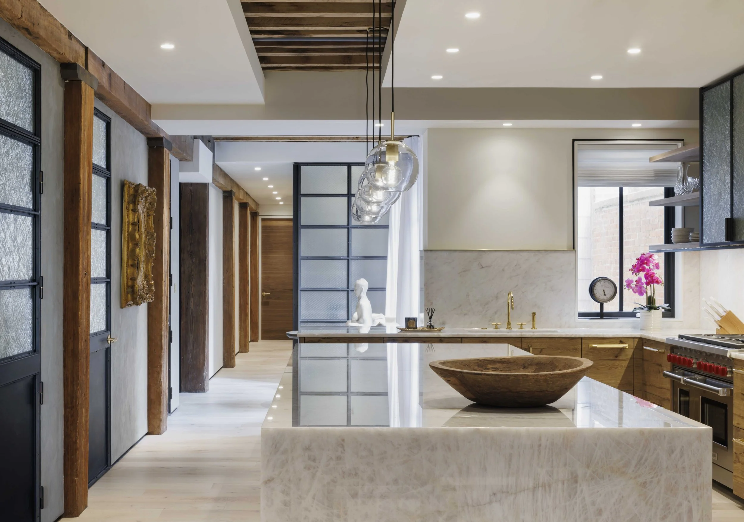  white marble countertop in living space with neighboring hallway  
