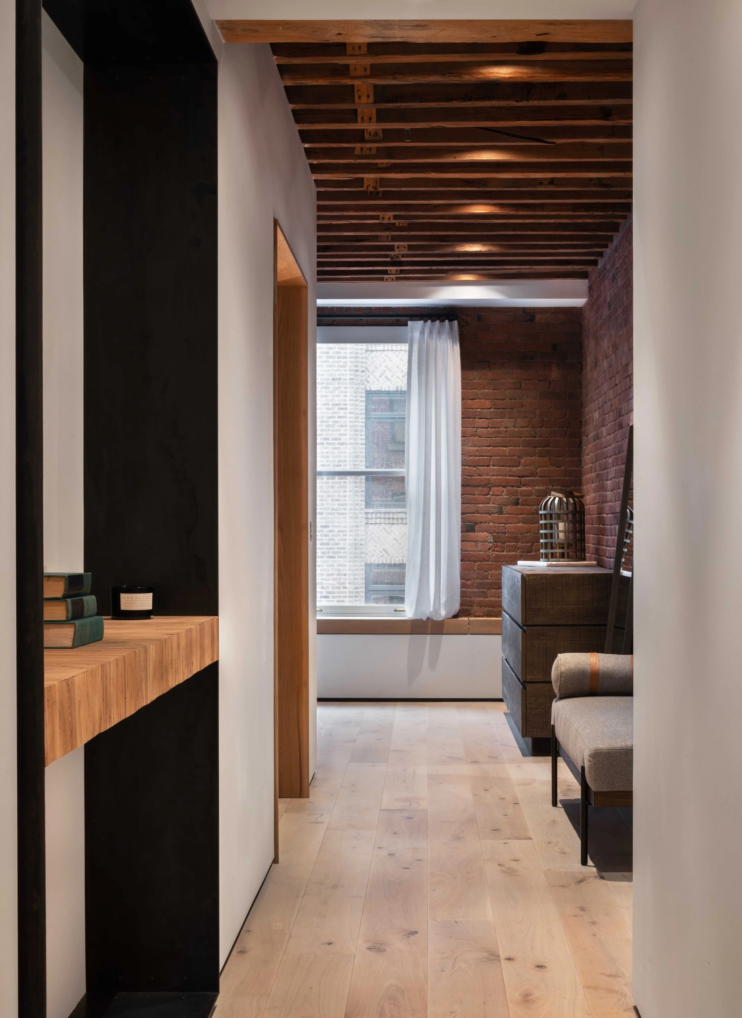  hallway with cool wooden flooring and accents 