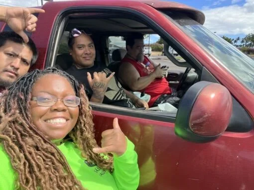 Photo of Leslee Matthews and colleagues providing disaster relief