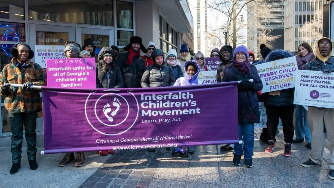 Photo of Interfaith Children's Movement members marcing in downtown Atlanta