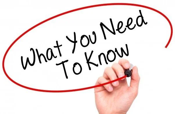 Handwriting on whiteboard that says 'What You Need To Know' with a red circle around it.