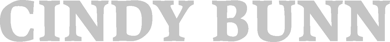 The name 'CINDY BUNN' written in large, bold, gray capital letters.