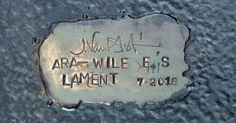 800Ara_Wile s Lament_sign.jpg