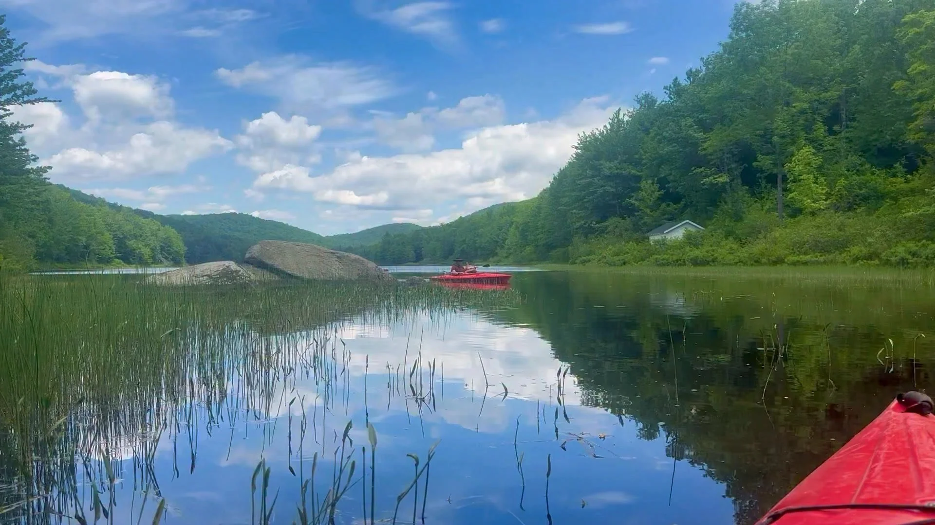 Spending a lazy summer afternoon on Gilman Lake near Wells, New York with Texas friends Simon And Autumn.