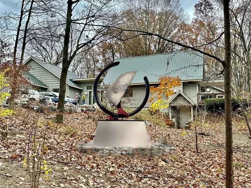 "SISYPHEAN CIRCLE (gash)"  2021,
granite/galvanized and powder coated steel, 66"h x62" x12"d (168 x157 x30 cm)