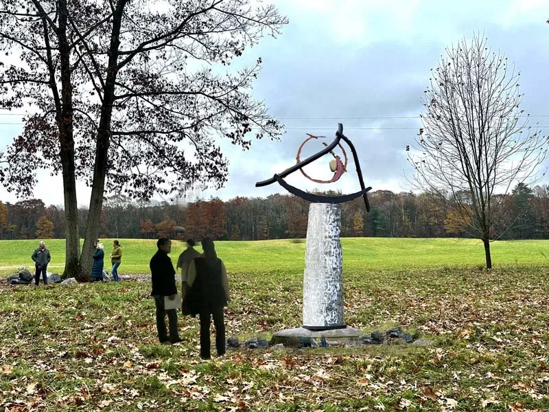 Sisyphean Circle (tank top),
2018, riverstone/stainless/galv and powder-coated steel, 117”h x75”w x30”d