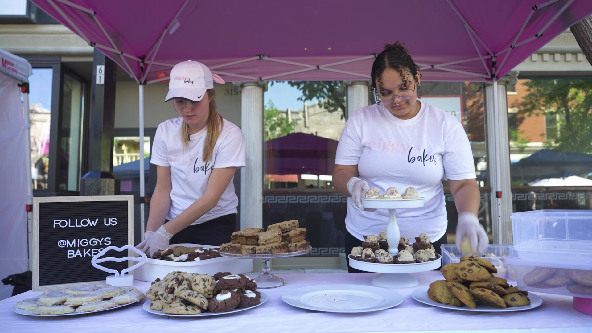 Miggy's Bakes Setting Up Booth at Madison Night Market on Sate Street