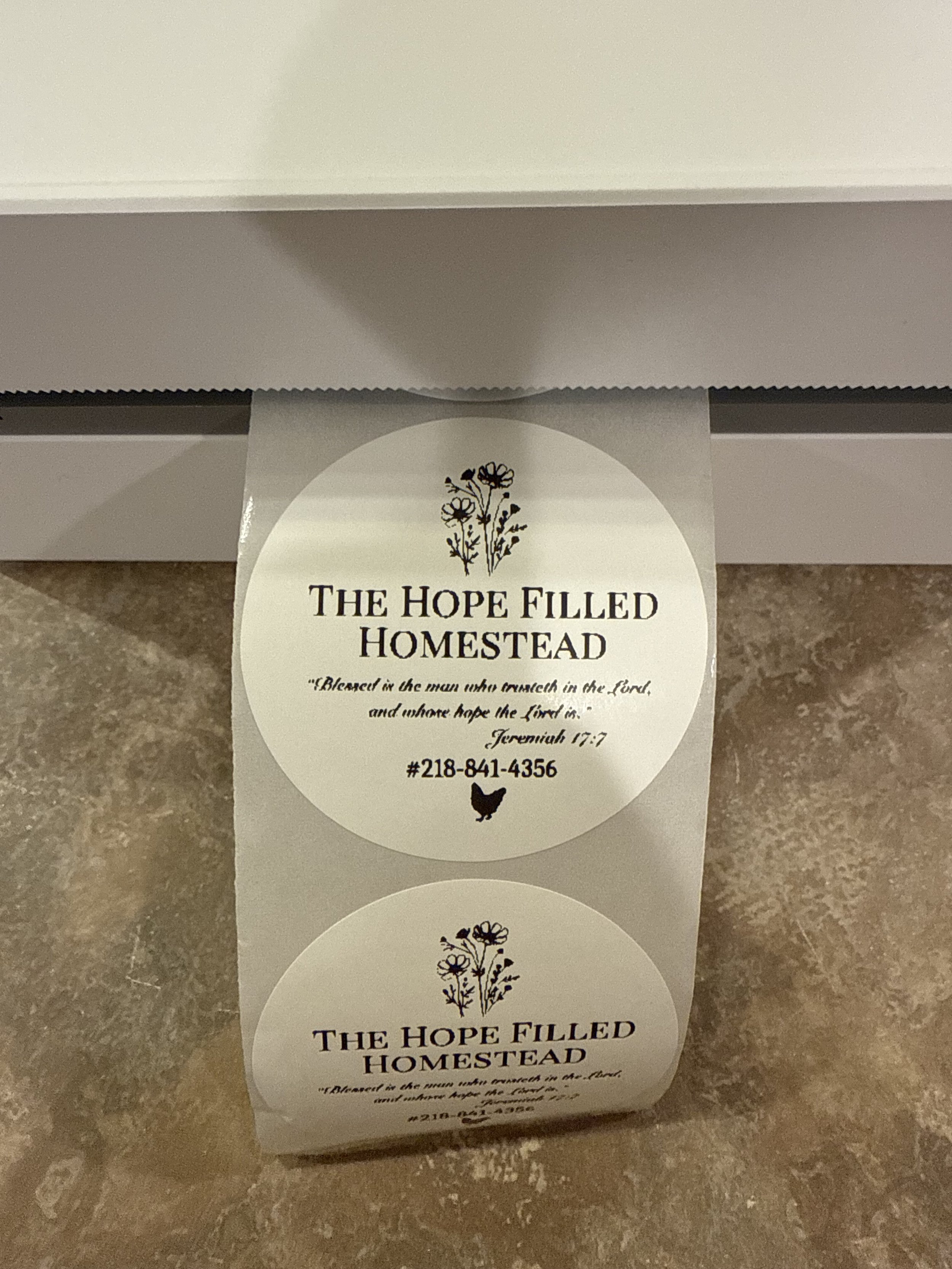 2inch white sticker labels with a custom business logo and information. 