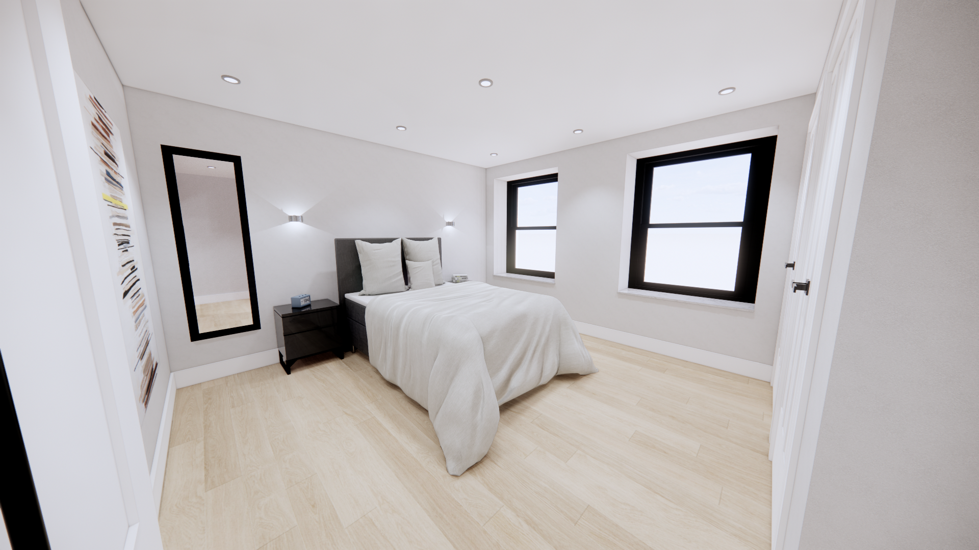 A modern bedroom with white walls, light wood flooring, and two black-framed windows. There is a bed with white bedding and pillows, a black nightstand with a clock and book, and a large black-framed mirror on the wall. Wall-mounted lights provide illumination.