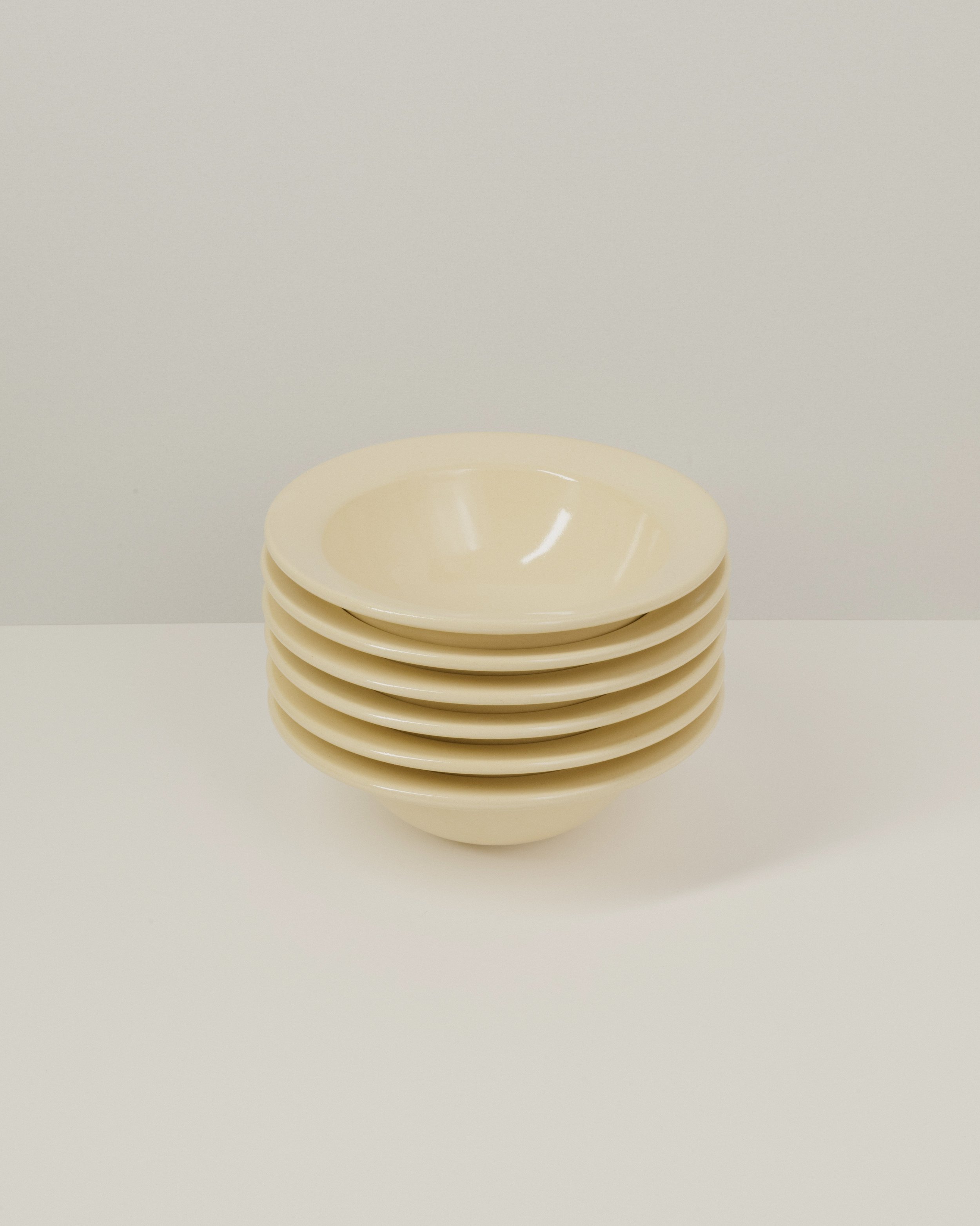 Yellow hat bowls stacked - 2023