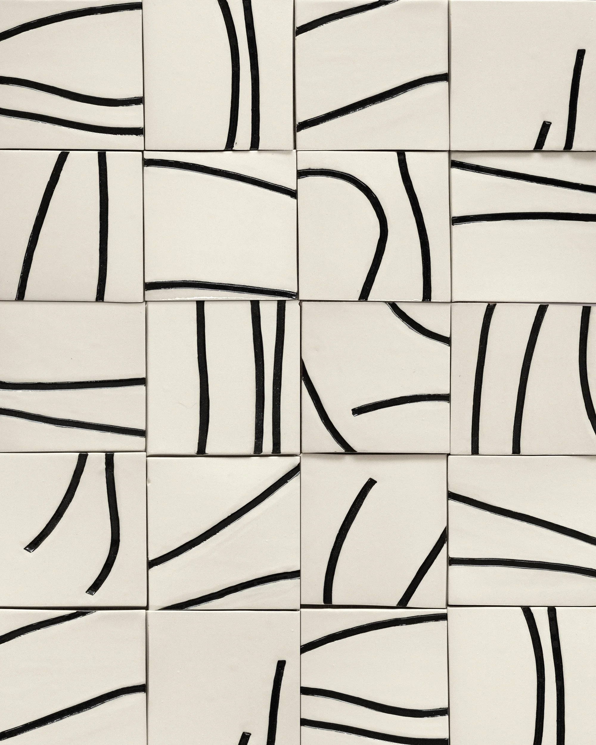 4" wall tiles made in collaboration with fellow ceramicist and friend Kristine Zingeler - 2024