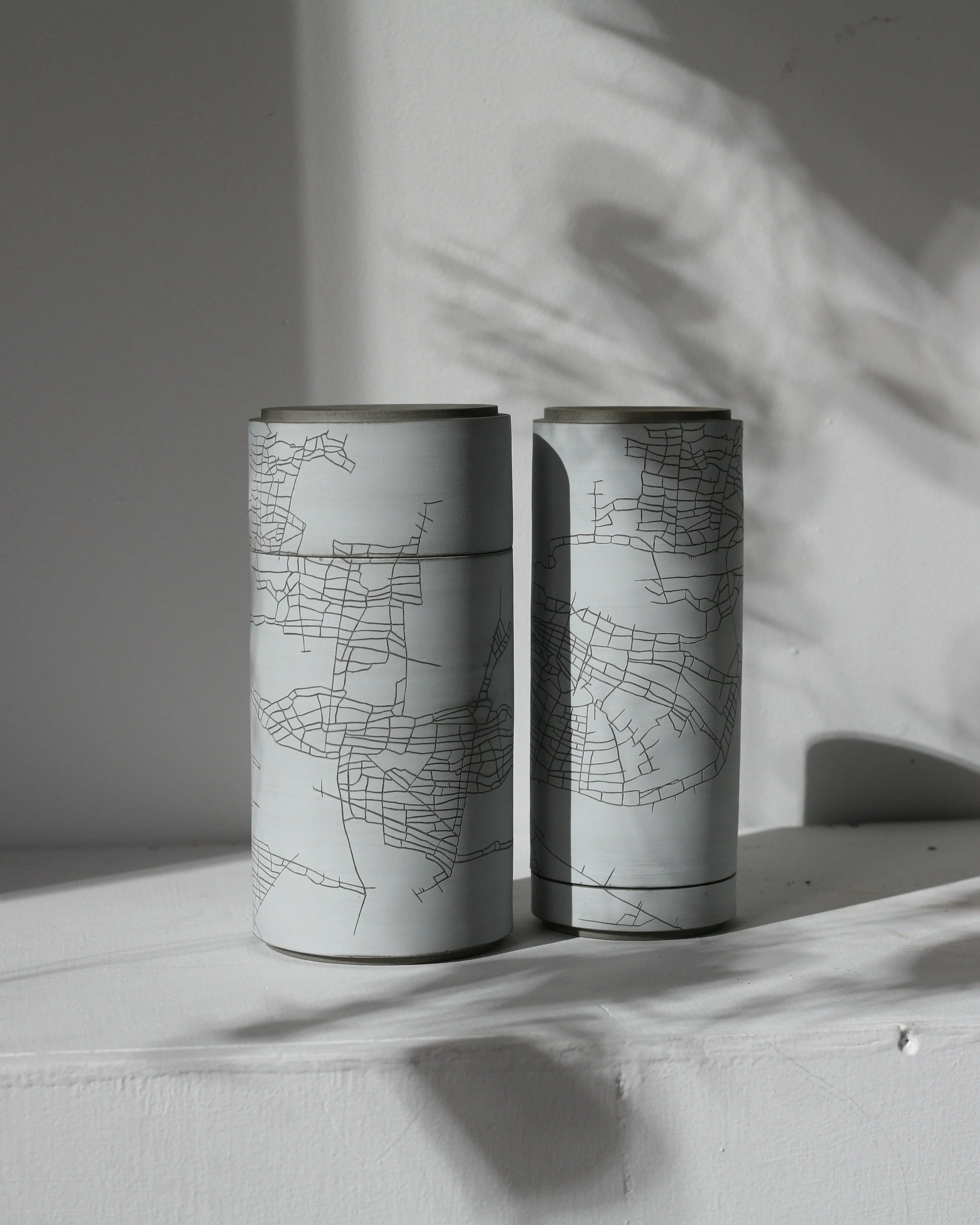 Another pair of urns, thrown by me and carved by Kristine Zingeler, for the show 'Shelter for What Remains' - 2018