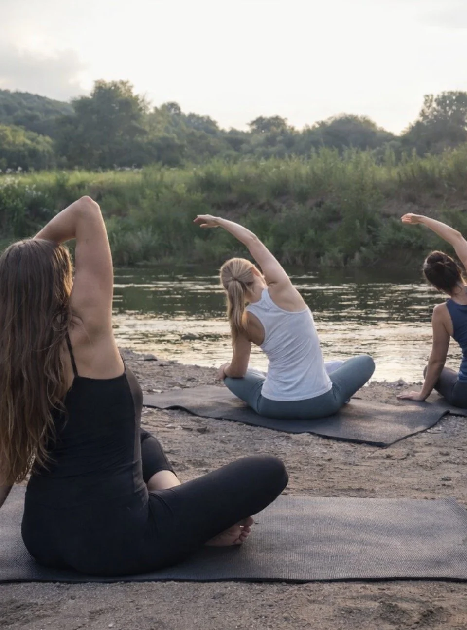 Stretching Session along a riverbank in western wisconsin