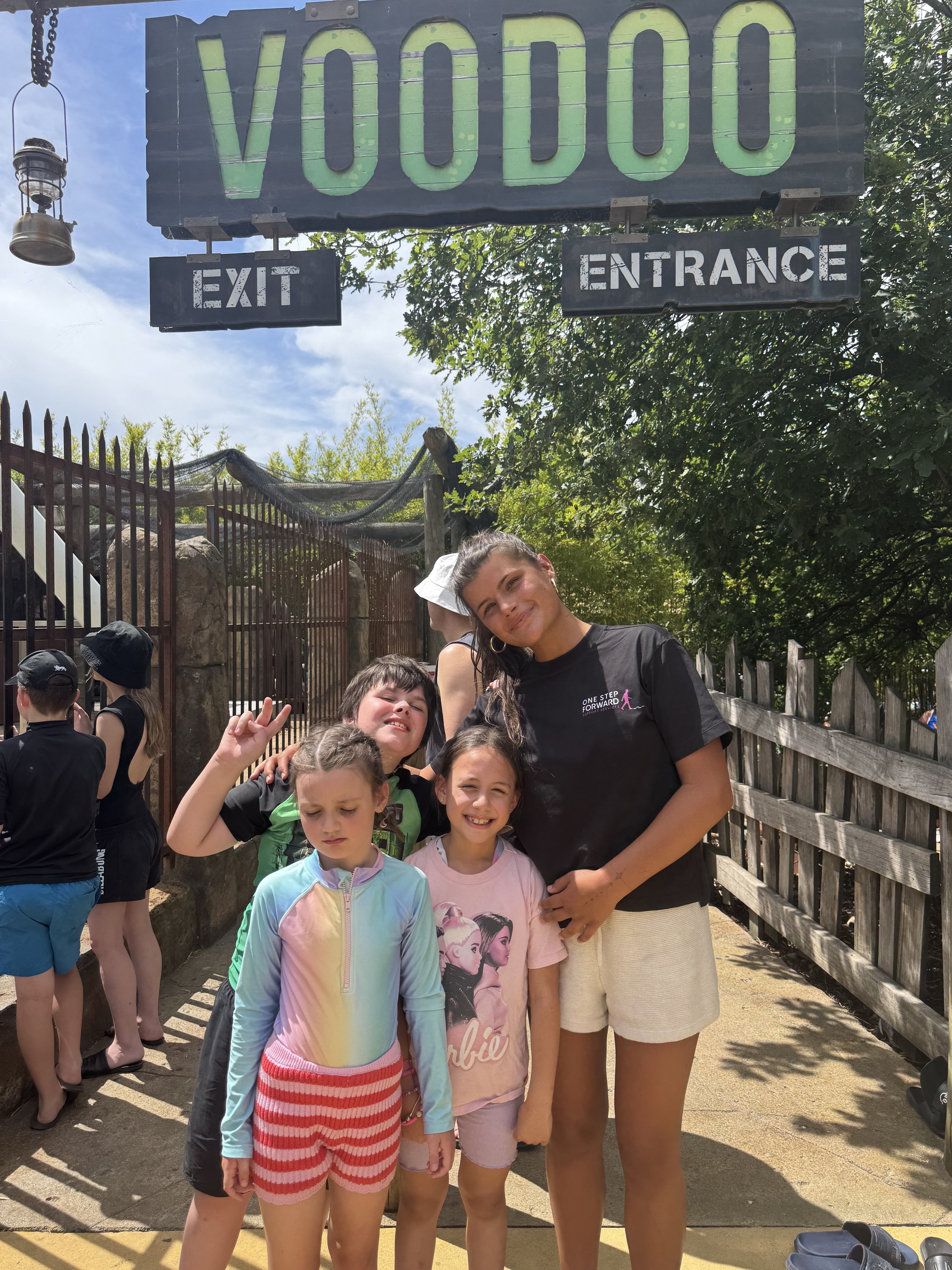 NDIS support worker assisting participants during a community outing in Melbourne, supporting social connection and inclusive experiences.