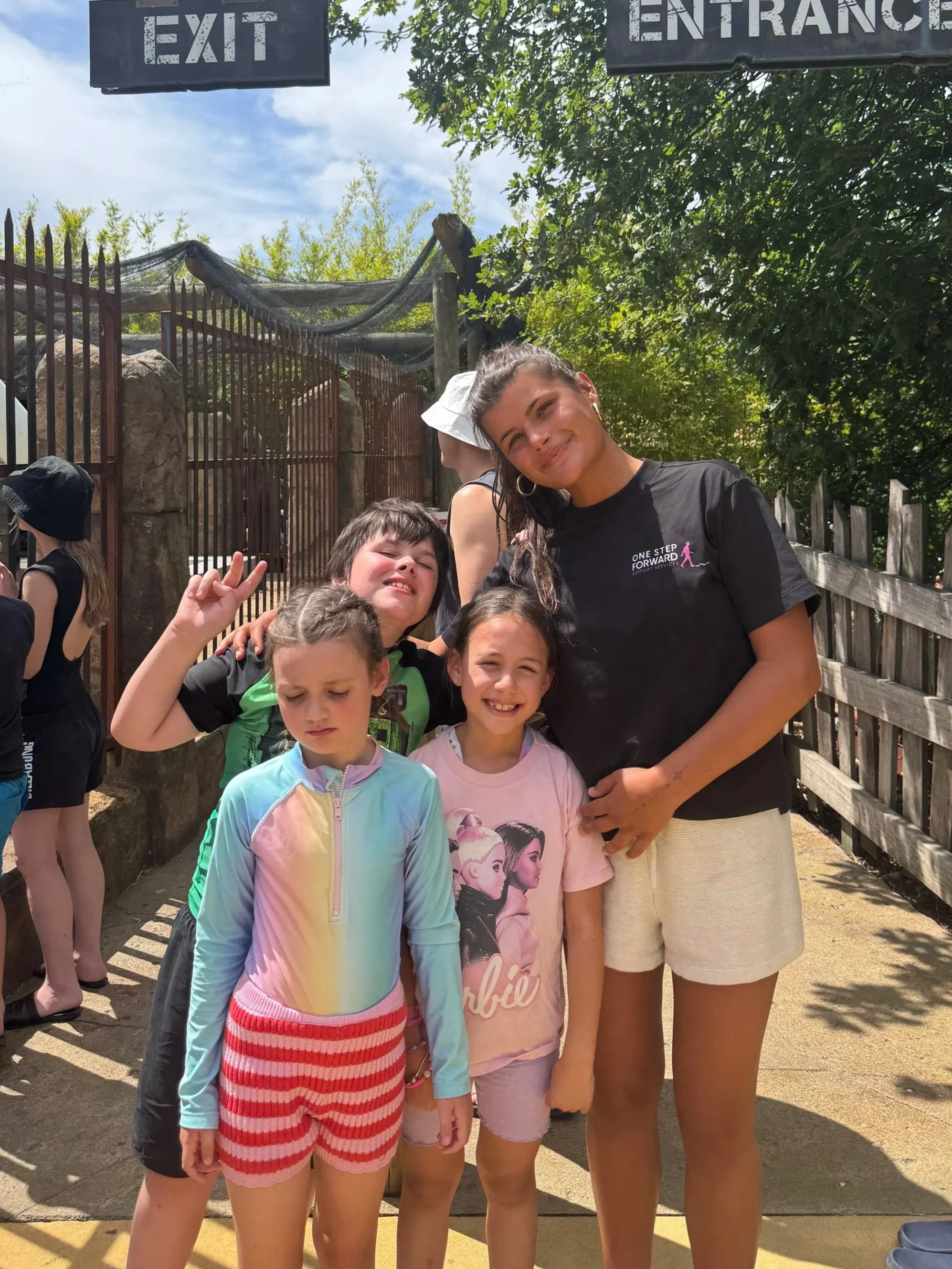 NDIS support worker assisting participants during a community outing in Melbourne, supporting social connection and inclusive experiences.