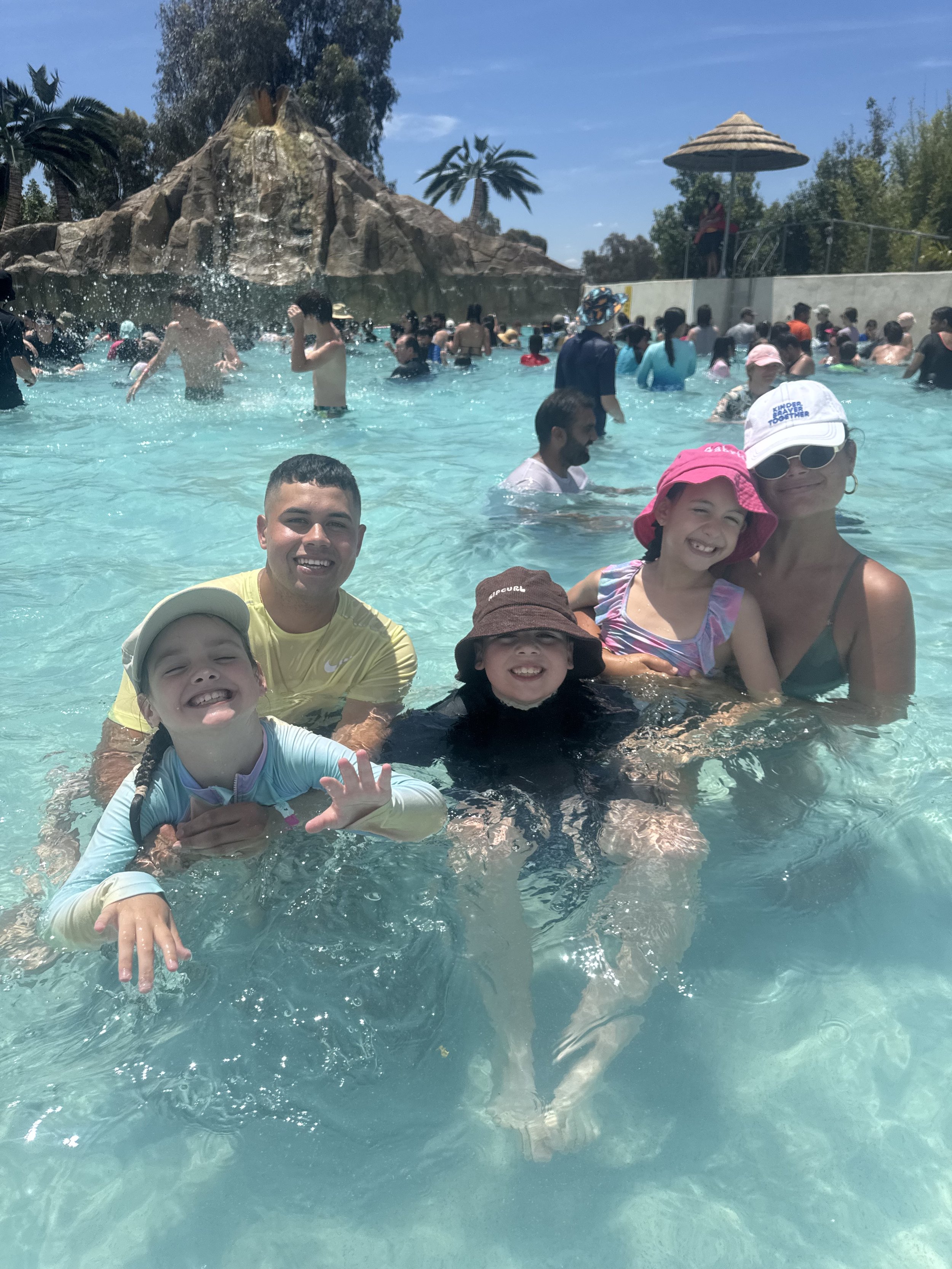 NDIS participants enjoying a supported swimming activity in Melbourne, promoting social engagement and active lifestyles.