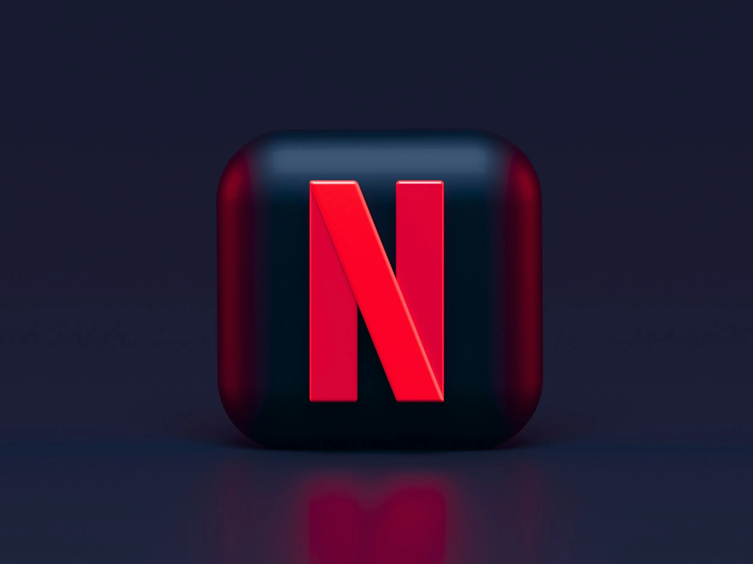 Netflix logo displayed on a digital screen with a dark background.