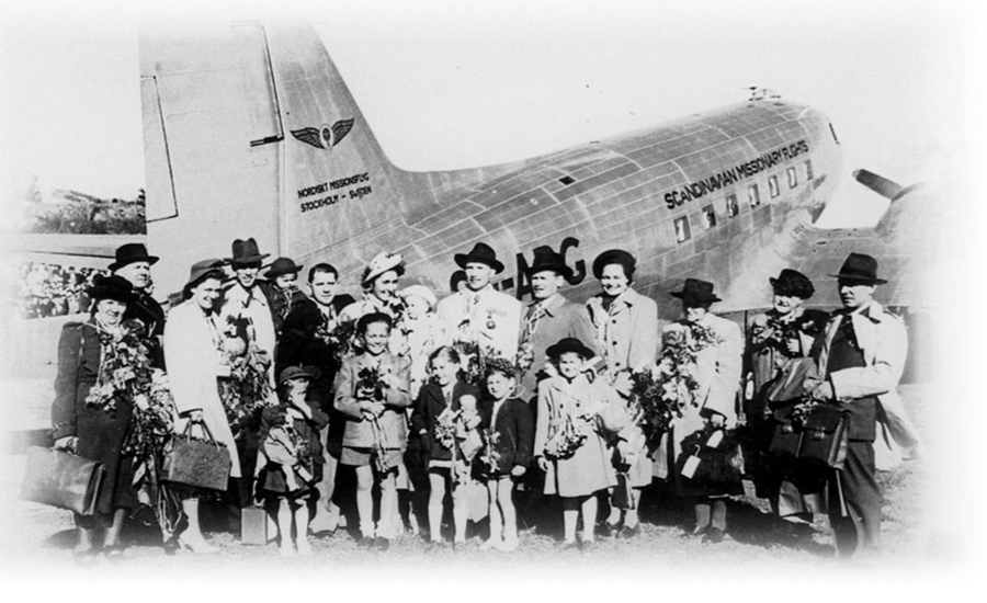 I mitten syns Dan-Jakob, 9 månader gammal, på mamma Miriams arm.