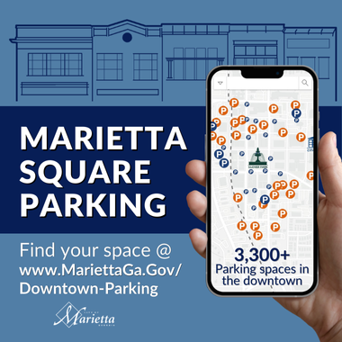 A graphic showing a hand holding a mobile phone with text and link to find parking around the Marietta Square.
