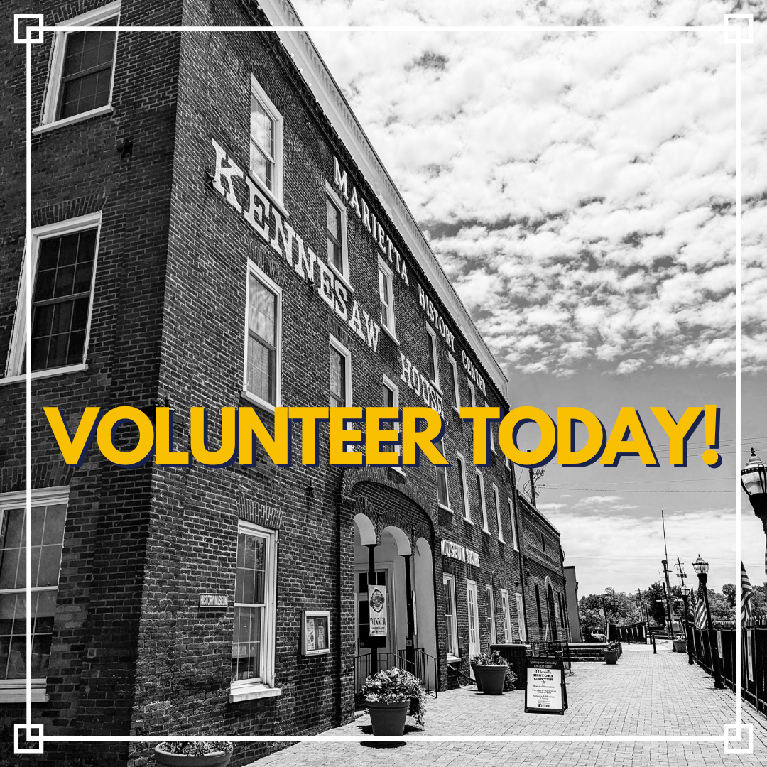 Black and white photo of a historic brick building with signs indicating the Maritime Museum. Large bold yellow text overlay says 'Volunteer Today!'