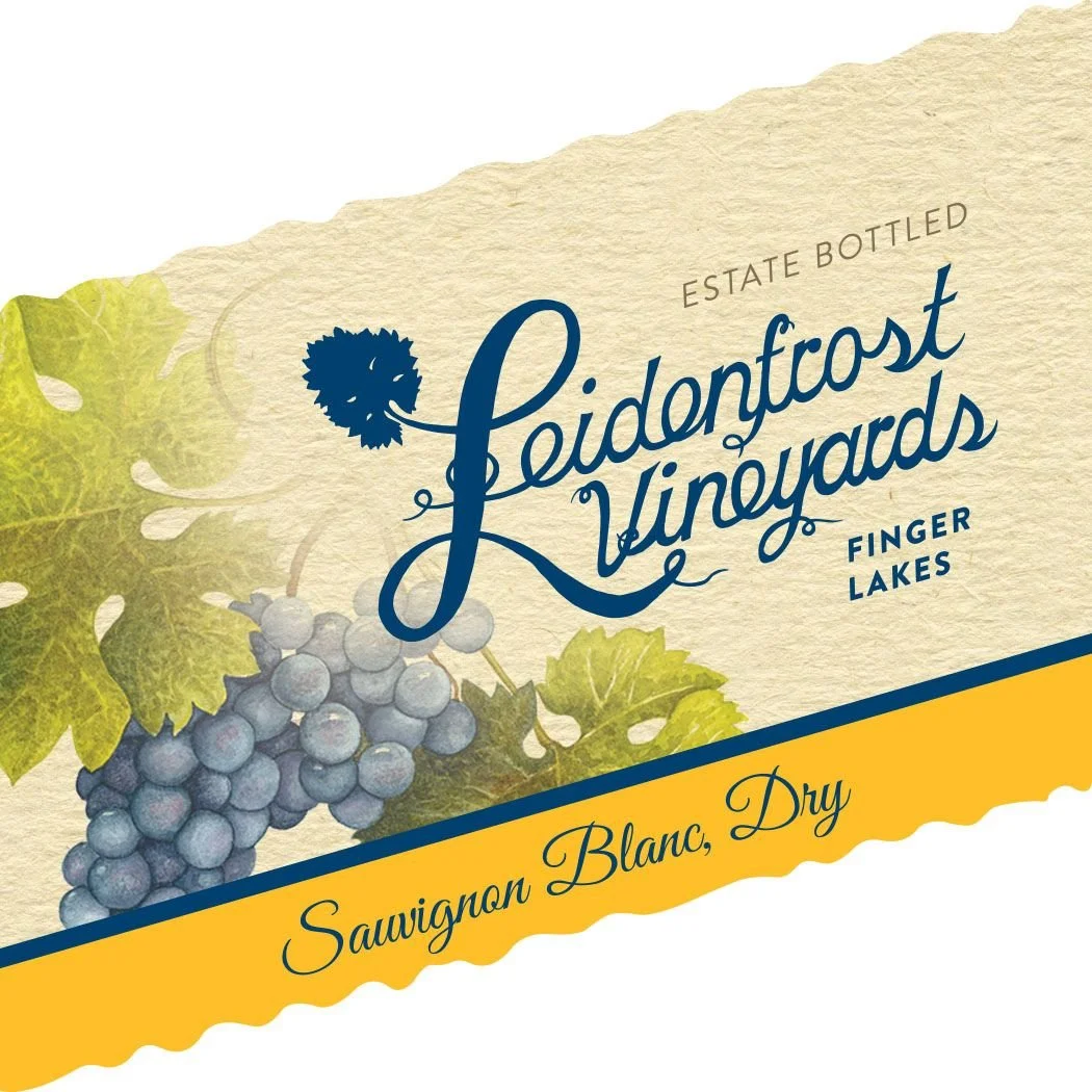 Label for Leidenfrost Vineyards estate bottled Sauvignon Blanc dry wine featuring a bunch of grapes and green leaves, with yellow and cream background.