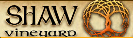Logo for Shaw Vineyard featuring the text and an orange circular tree emblem