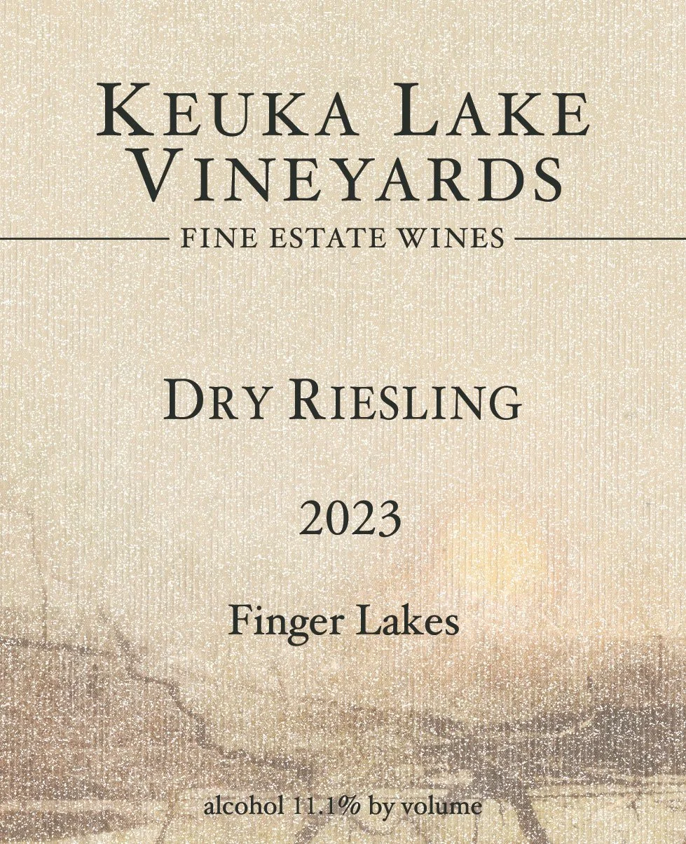 Wine label for Keuka Lake Vineyards' 2023 Dry Riesling, Finger Lakes, with an abstract background of a lake scene.