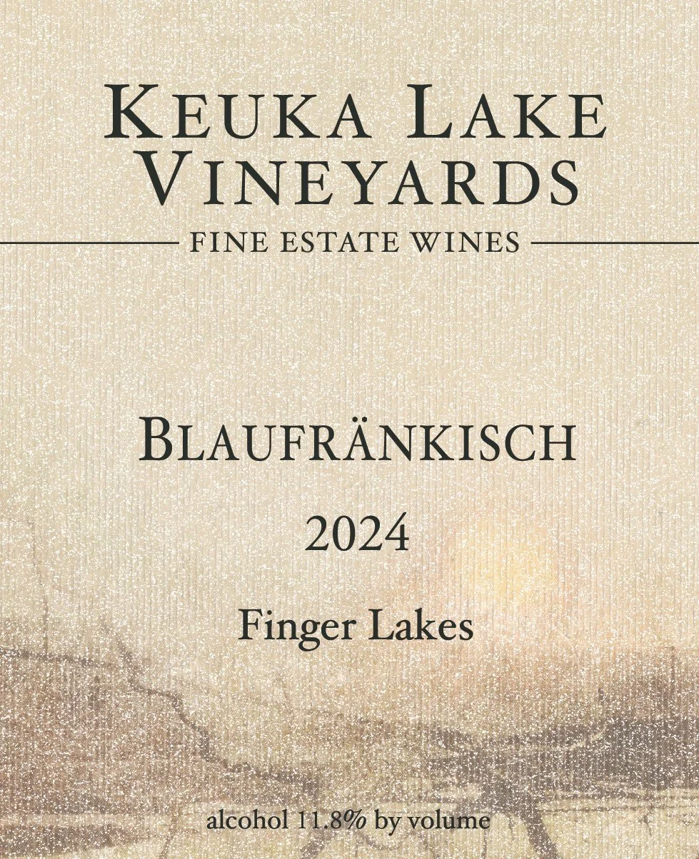 A wine label from Keuka Lake Vineyards featuring a beige, textured background. It states the wine is Blaufränkisch 2024 from Finger Lakes, with alcohol content of 11.8%.