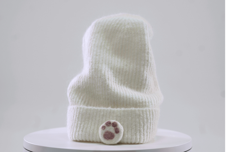 Kitten Paw Meditation Cap. Places a kitten paw over the third eye and turns the heart into a kitten.