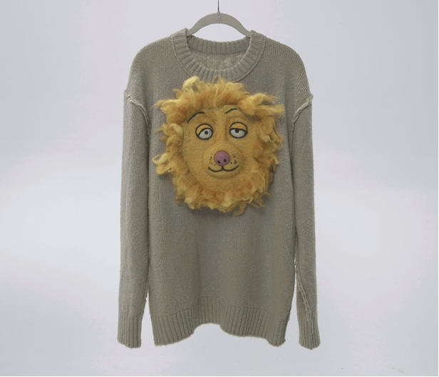 Snuggle Sweater. Hides a favorite stuffed animal beneath business attire, bringing comfort and courage into adult life.