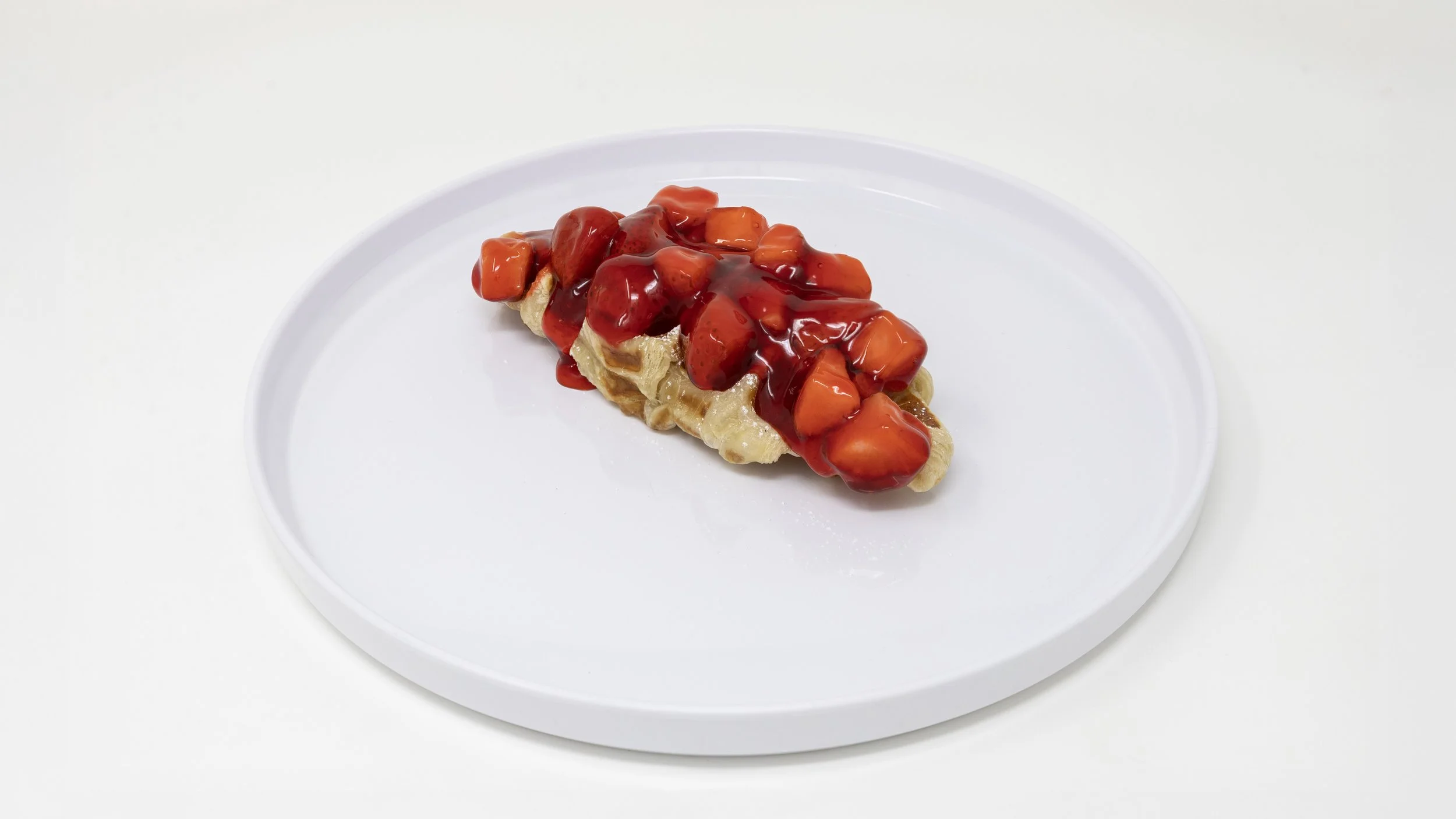 A slice of pie with a crumbly crust topped with strawberry and orange fruit chunks and red sauce, on a white oval plate.