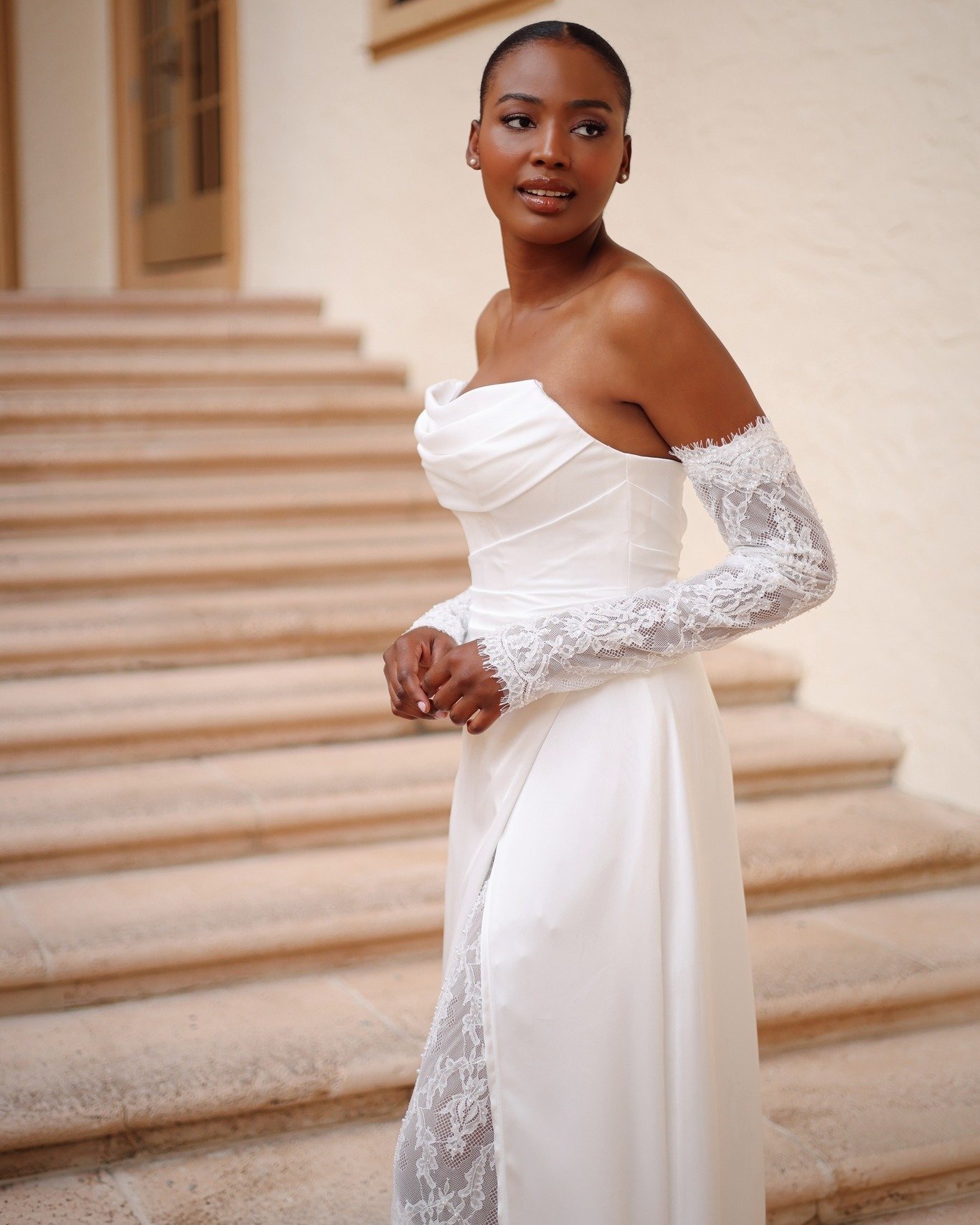 Amara is refined simplicity elevated to couture, a sculpted satin bodice with delicate lace sleeves that frame every movement with intention.

#ZakaaCouture #weddingdress #luxurybridal #bridalfashion #dmvbrides