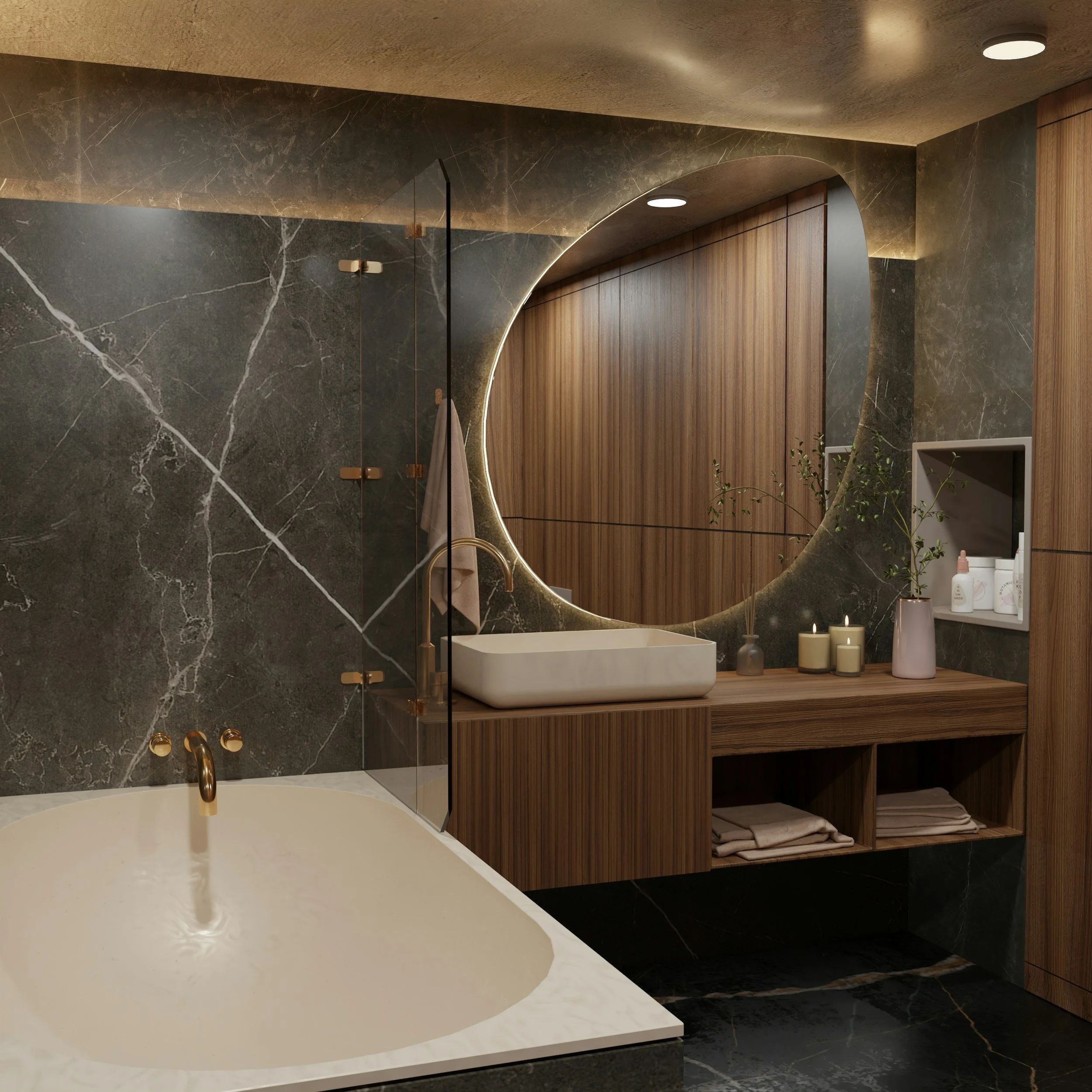 Modern bathroom with a black marble wall, a large round mirror with LED lighting, a white rectangular sink on a wooden vanity, and a bathtub with gold fixtures. Decor includes candles, small plants, and toiletries.