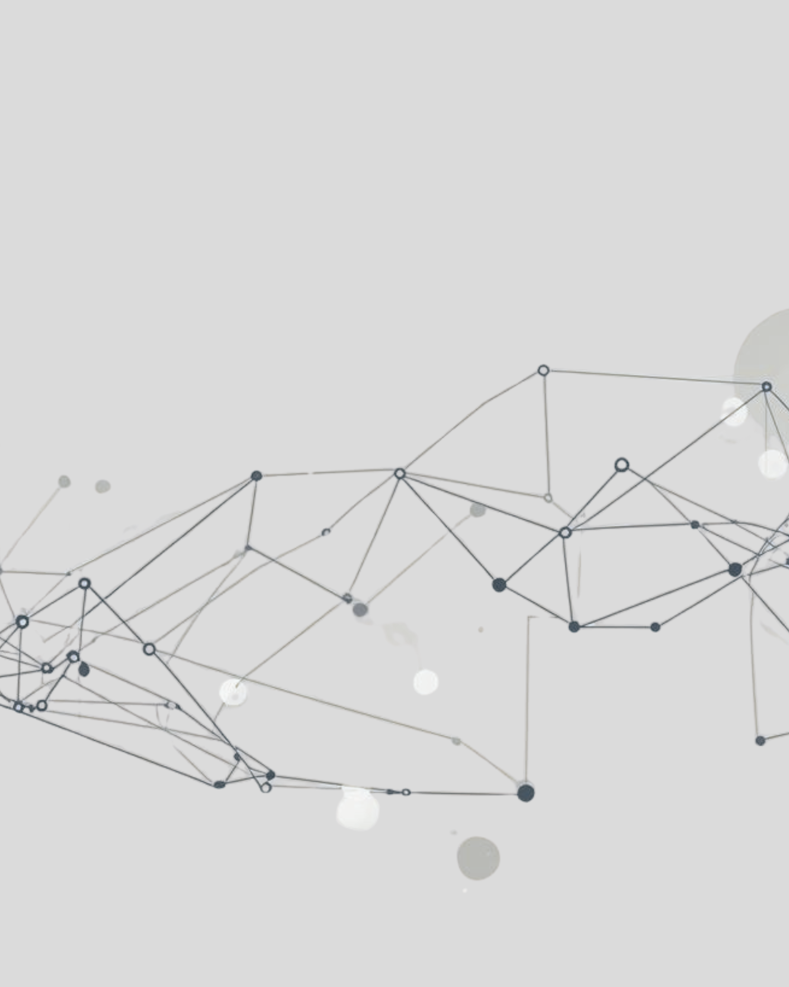 A female doctor with a stethoscope around her neck talking to a patient in an office setting with a computer, telephone, and a model of a skull in the background.