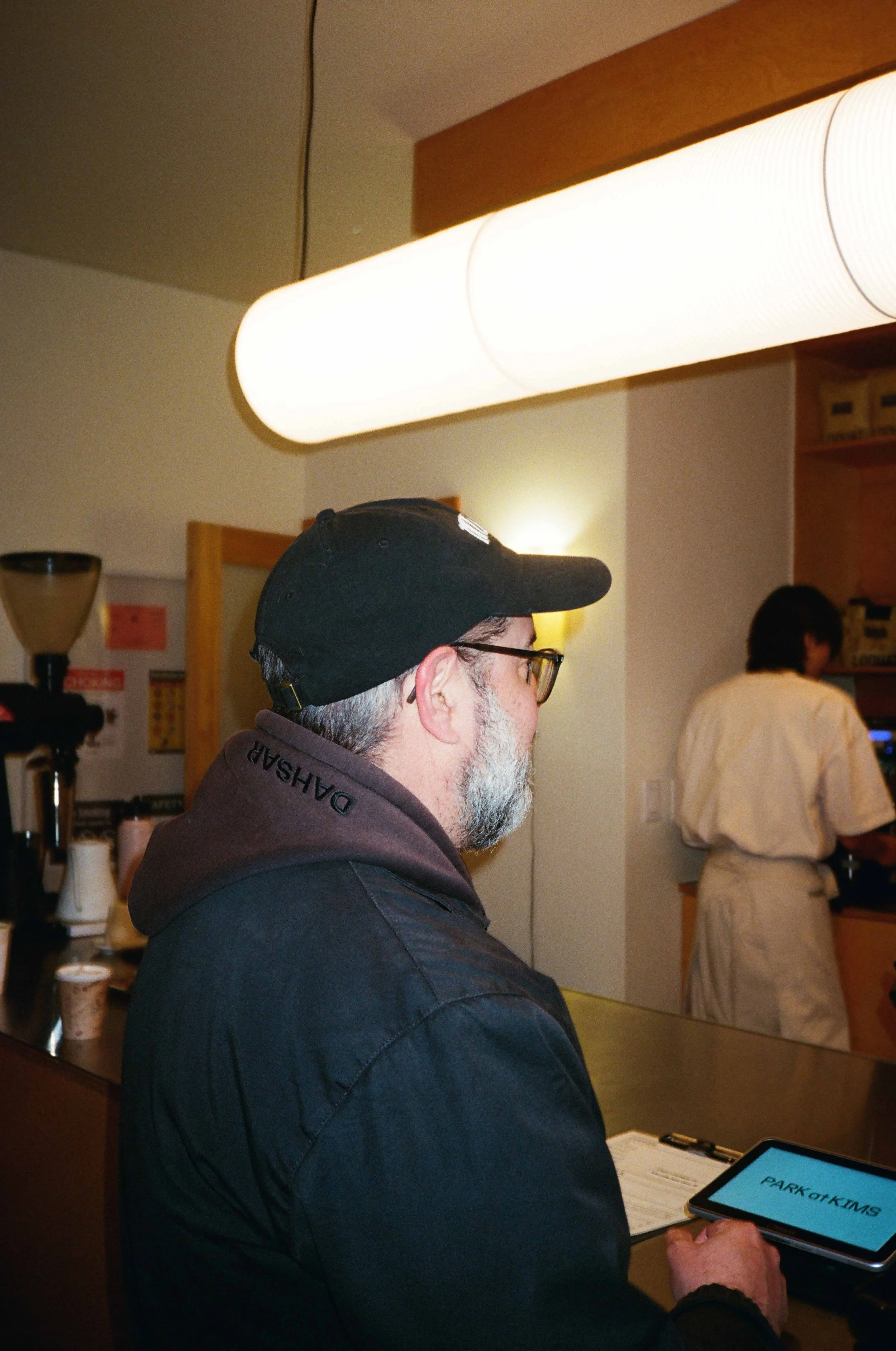 Christian Schwartz of Commercial Type wearing the Dahsar and Commercial Type collaboration hoodie as well as the Matsar cap.