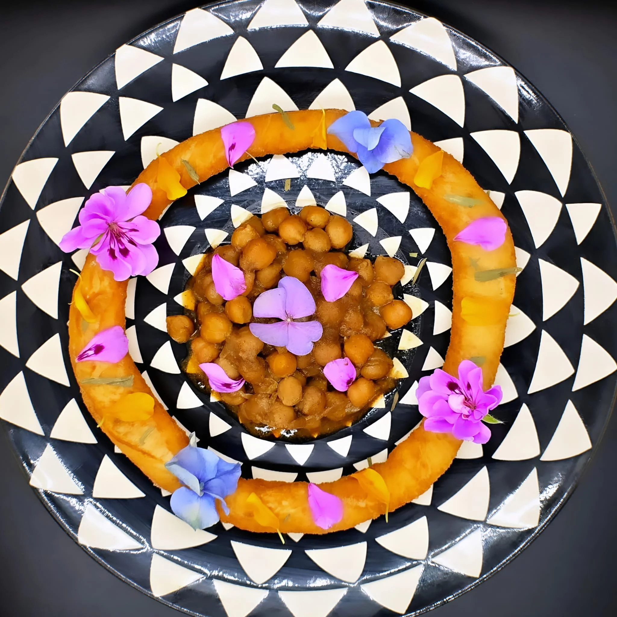 Modern plated dinner course as part of a chef-led catering experience