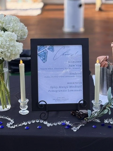 Printed event menu displayed as part of a curated tablescape