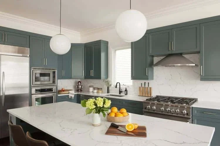 BM Simply White on walls and Farrow &amp; Ball Inchyra Blue on cabinets.