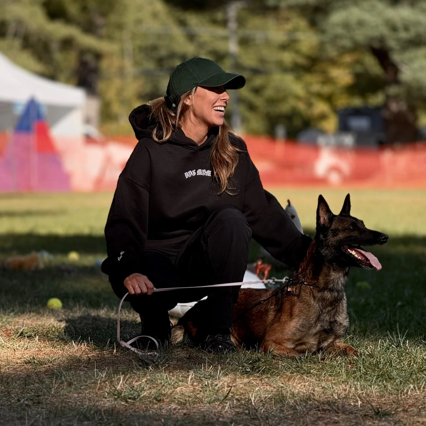 Calm obedience training with Belgian Malinois at dog competition