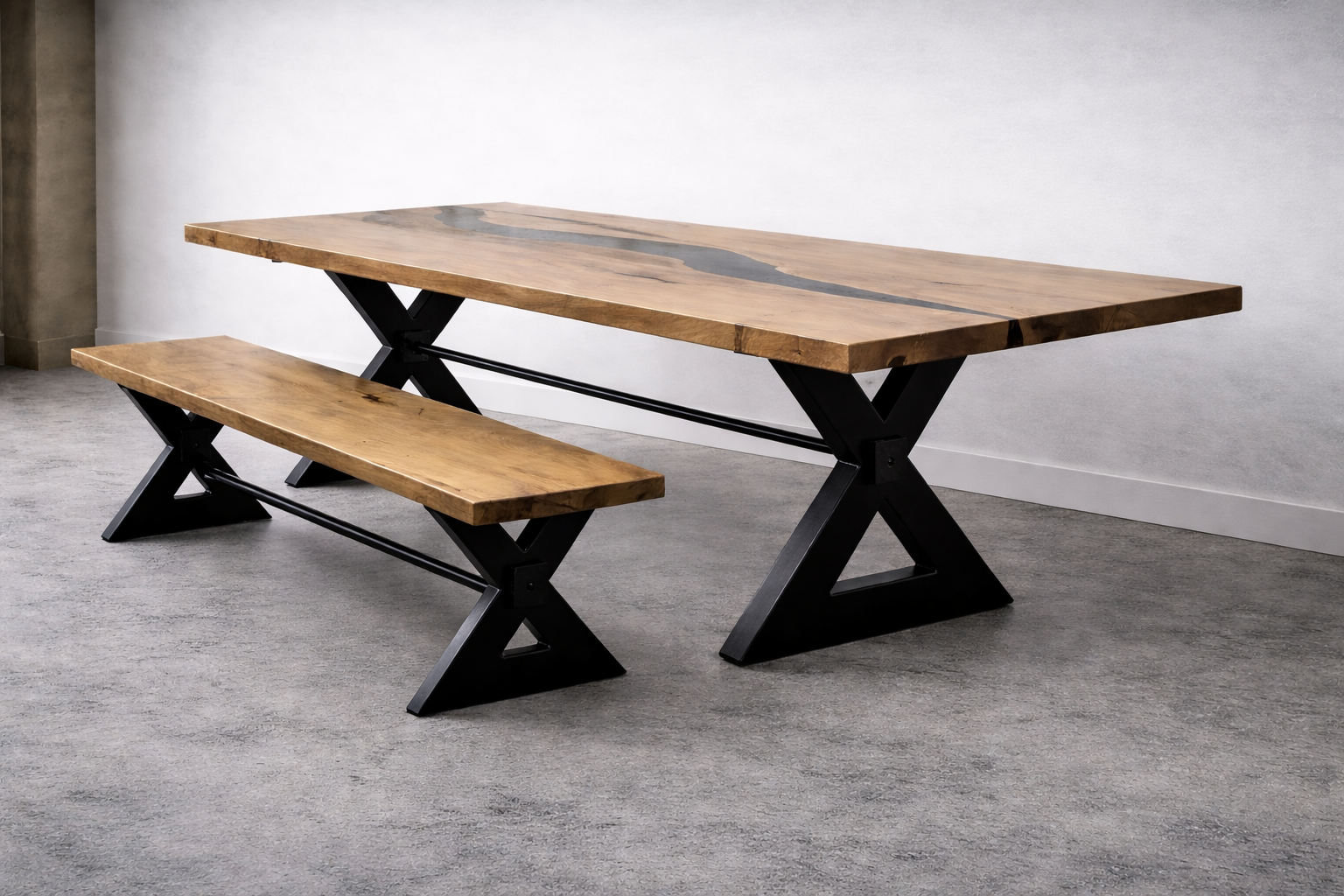 A modern wooden dining table with a matching bench, both with black angled metal legs in a minimalistic room.
