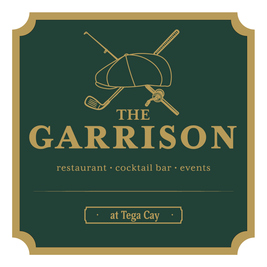 A logo for The Garrison restaurant featuring a golf ball with a golf club, straw, and pen crossed behind it, styled in gold on a dark green background, with text detailing its location at Tega Cay and its focus on food, cocktails, and events.