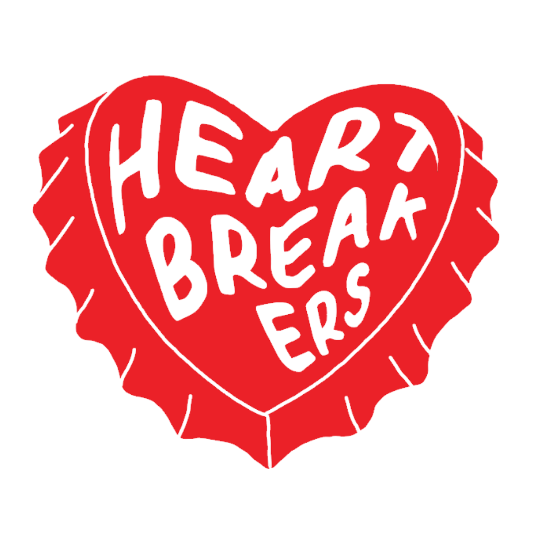 Red heart-shaped object with the words 'Heart Breakers' written inside in black, stylized text.