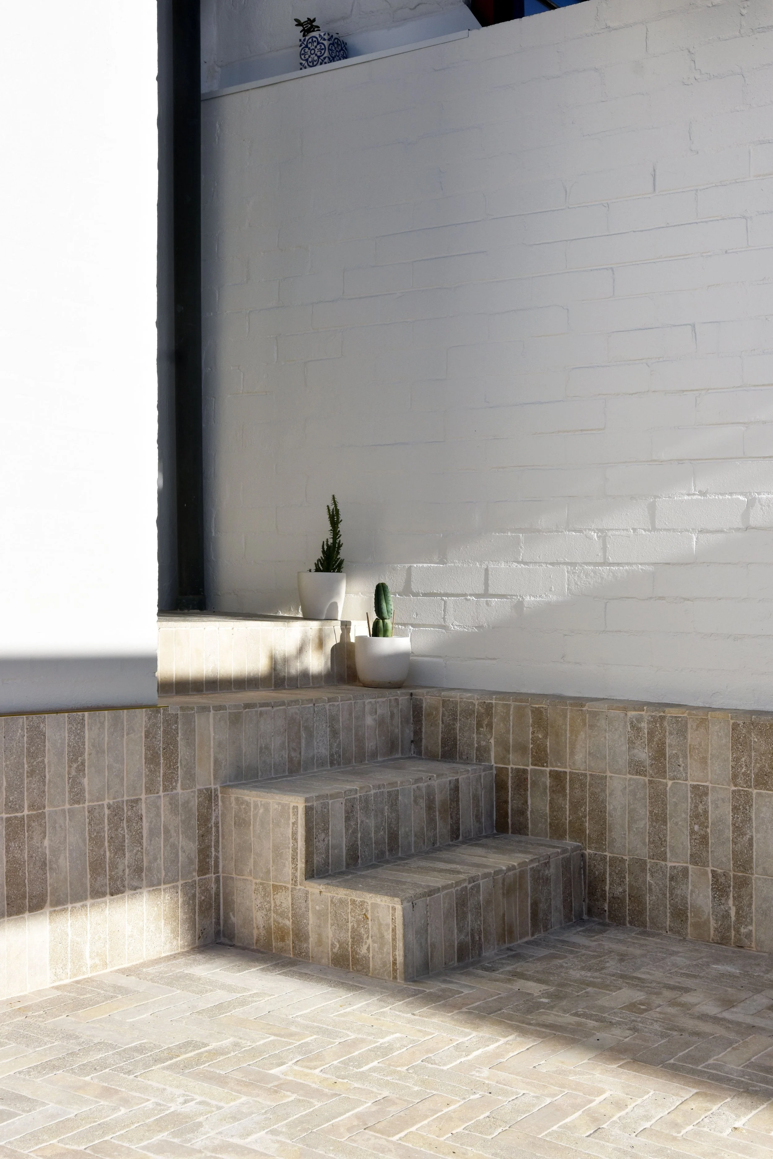 Completed rear courtyard renovation of a heritage terrace in Paddington, Sydney, within a Heritage Conservation Area.