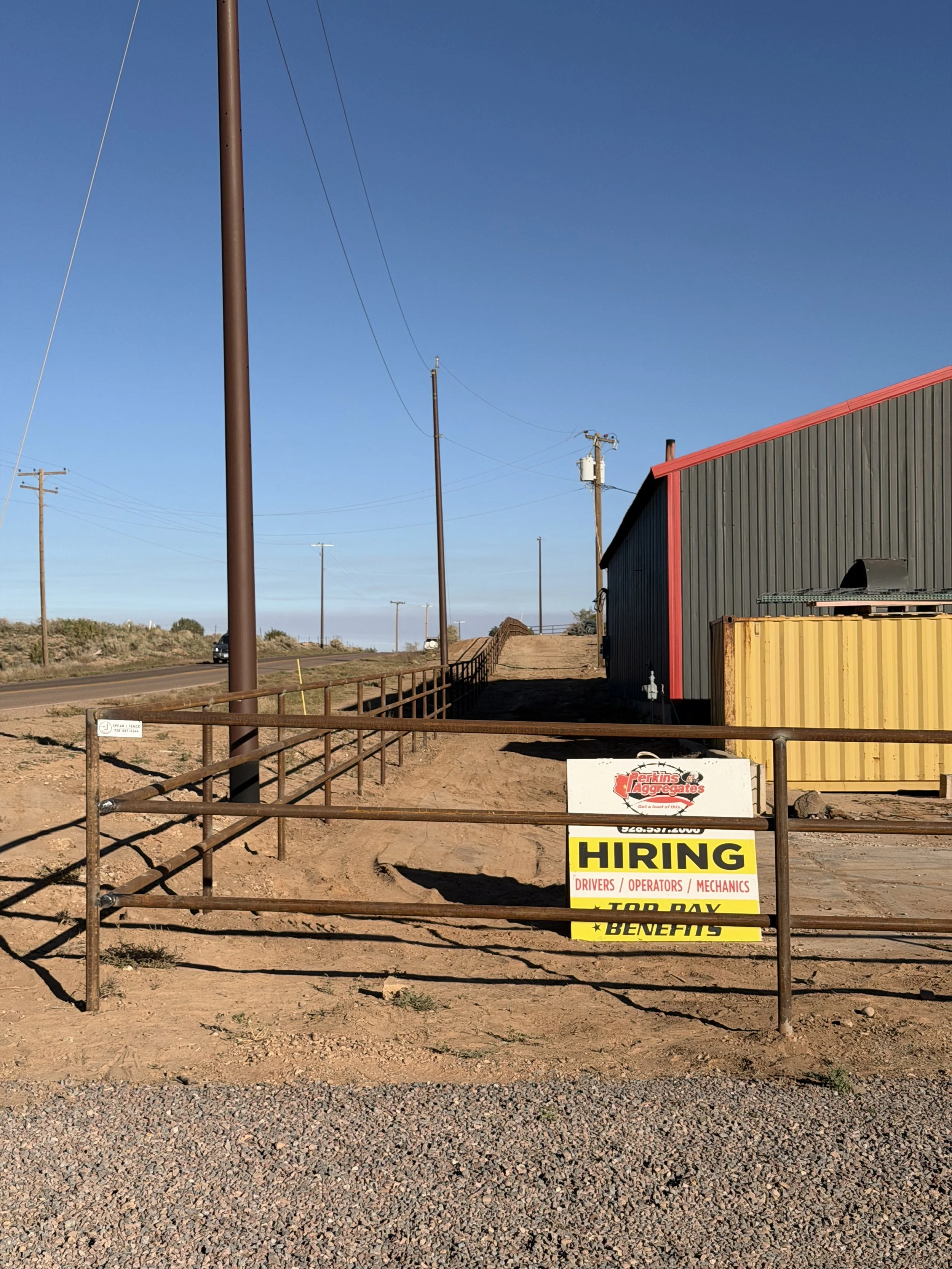 A hill with a pipe fencing in Taylor AZ for Perkins Aggregates.