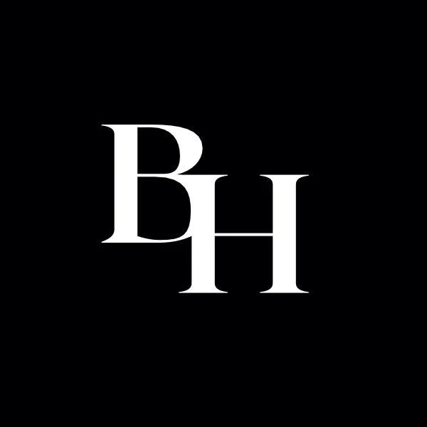 Black background with white monogram of the letters B and H overlapping.