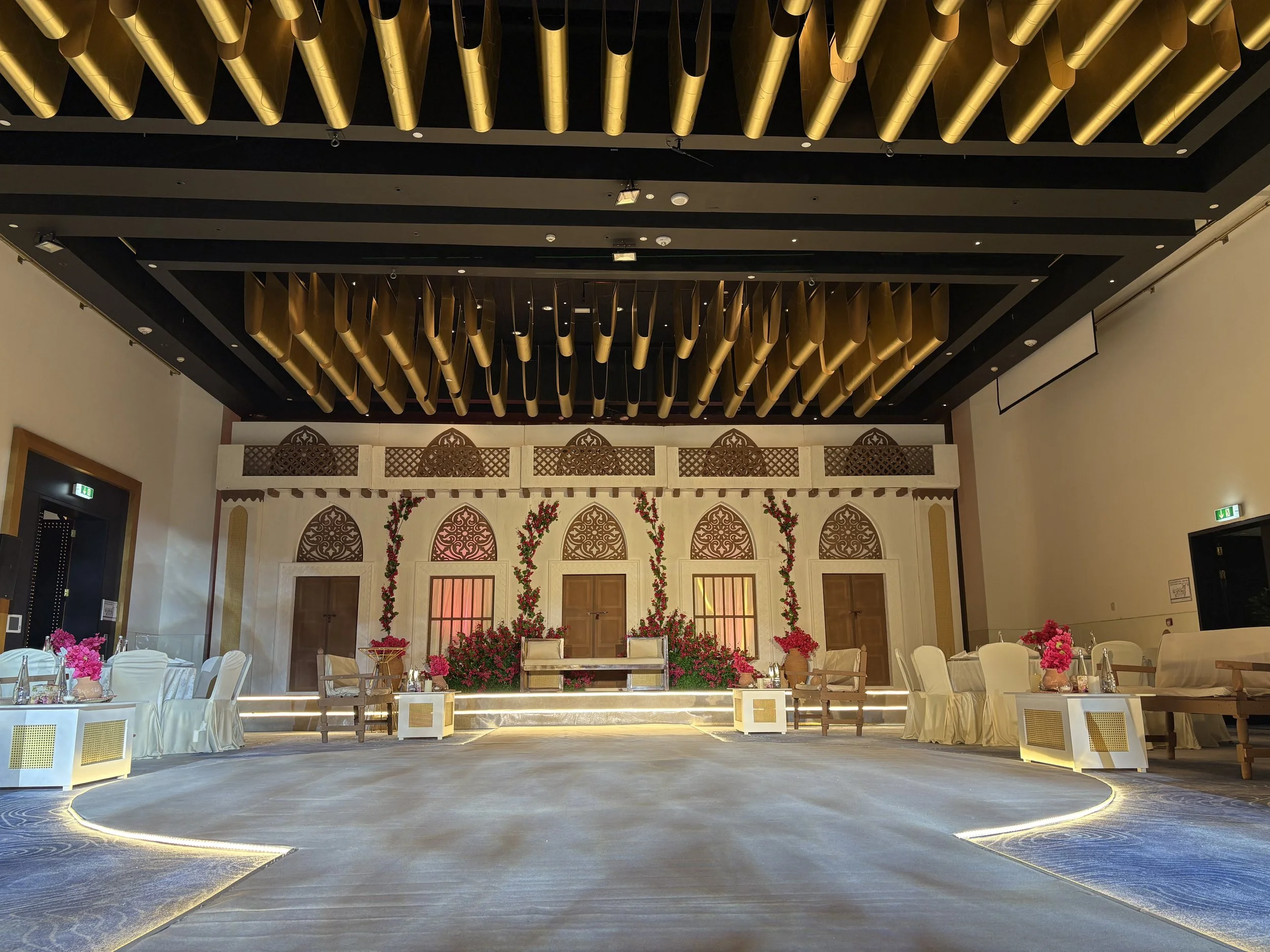 Signature blue atmospheric lighting by EchoLight featuring vertical cinematic beams and the water ripple effect to create an immersive, luminous experience for premium events