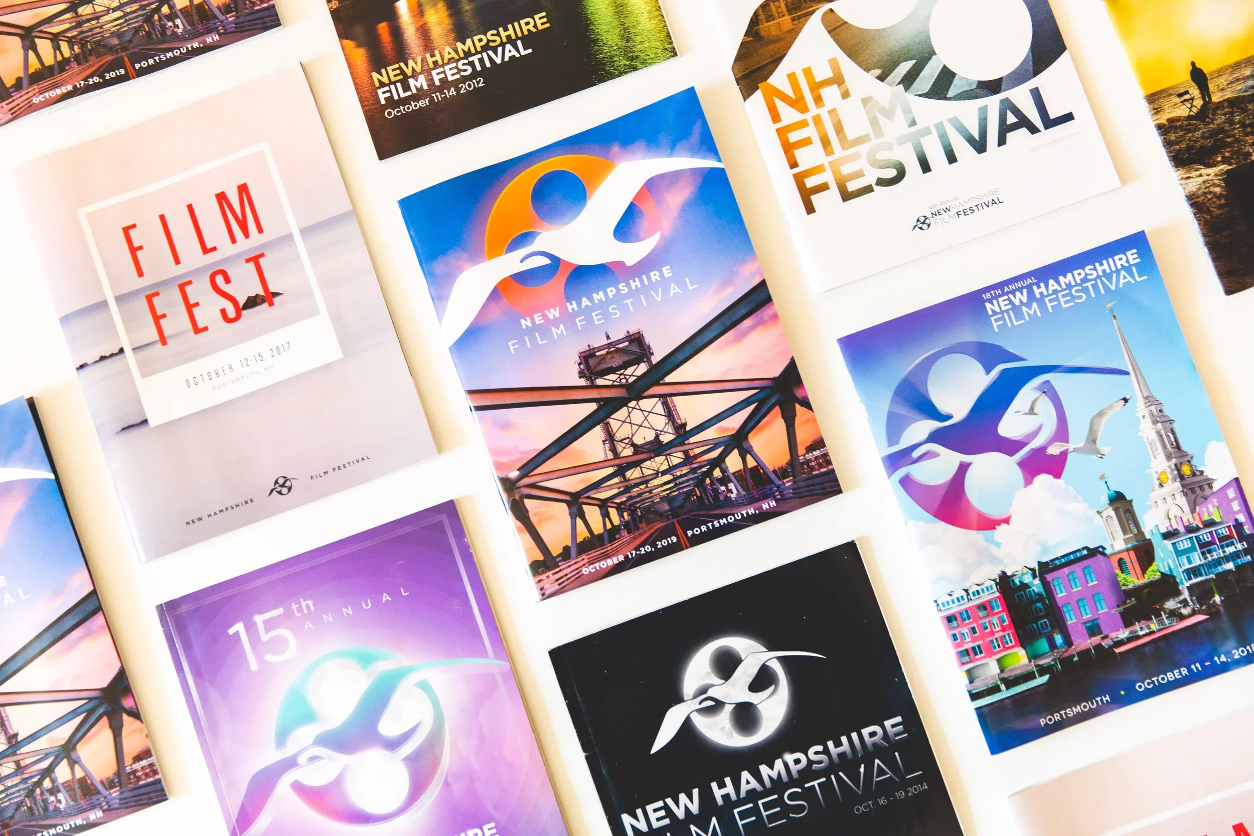 Collection of New Hampshire Film Festival posters displaying various designs and dates.